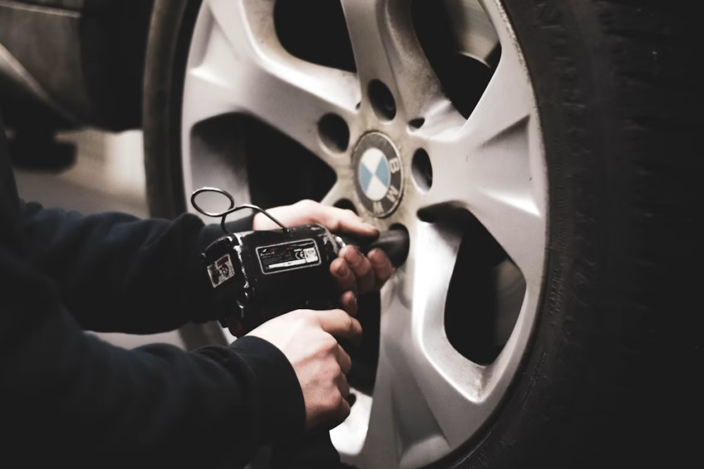What Does Car Service Include: Removing wheel nuts tyre.
