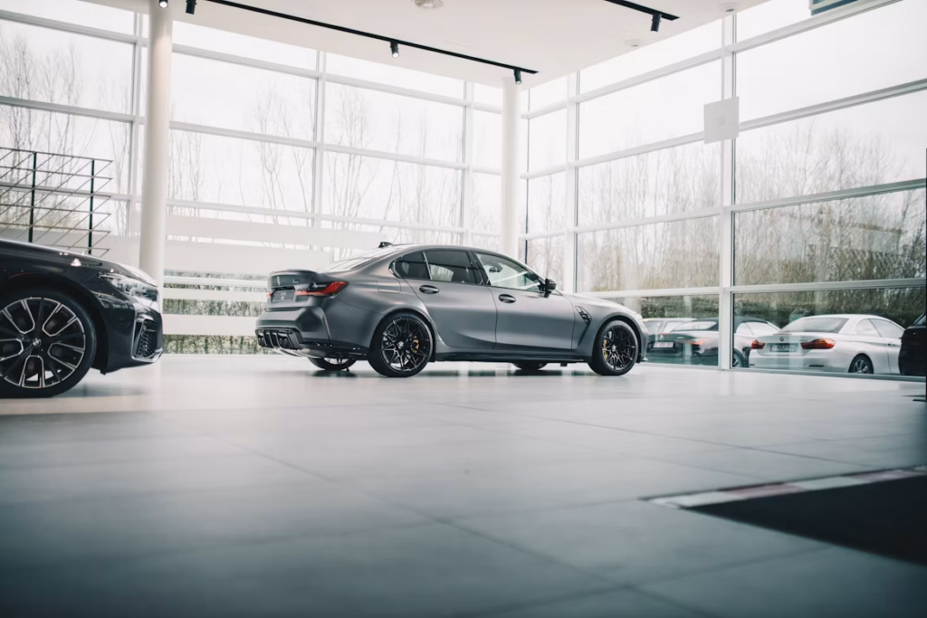 How to check a car's service logbook: a car in a showroom.