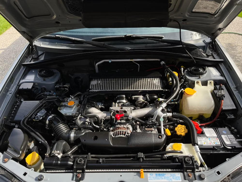 DIY Car Maintenance: Engine bay reservoirs.